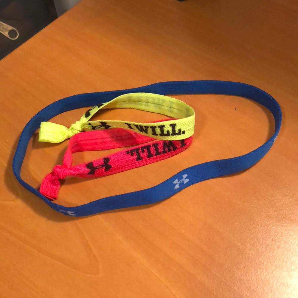 Royal blue under armour headband and two hair bows